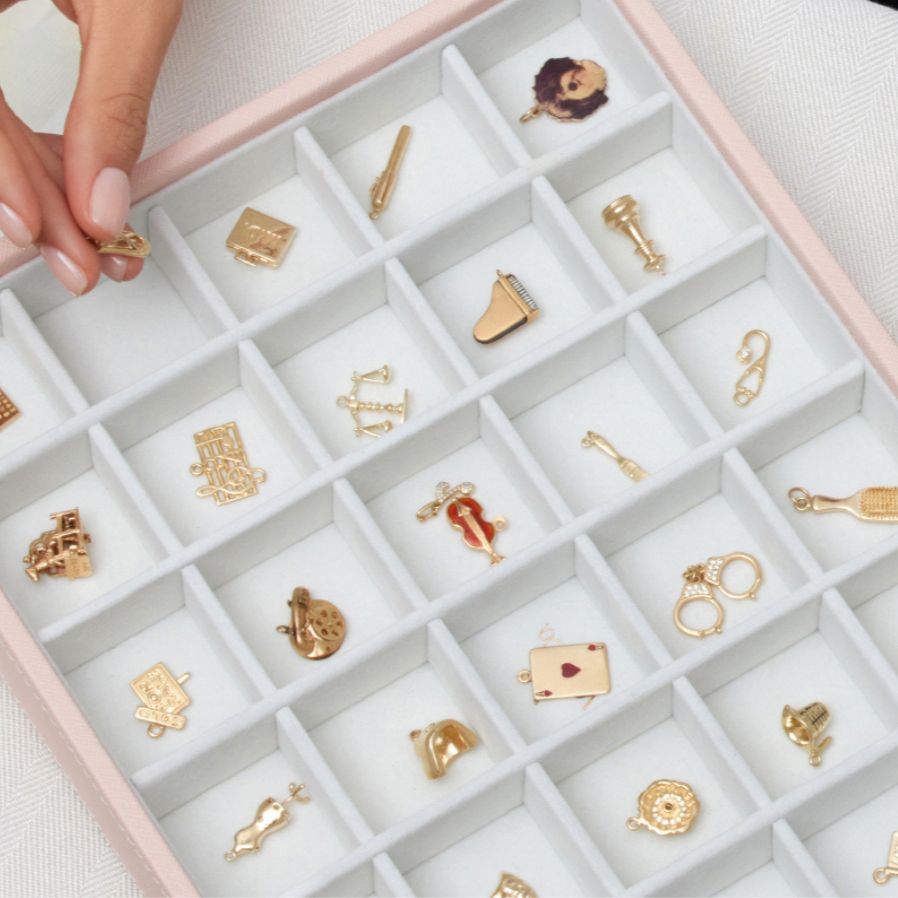 organizing charms into boxes